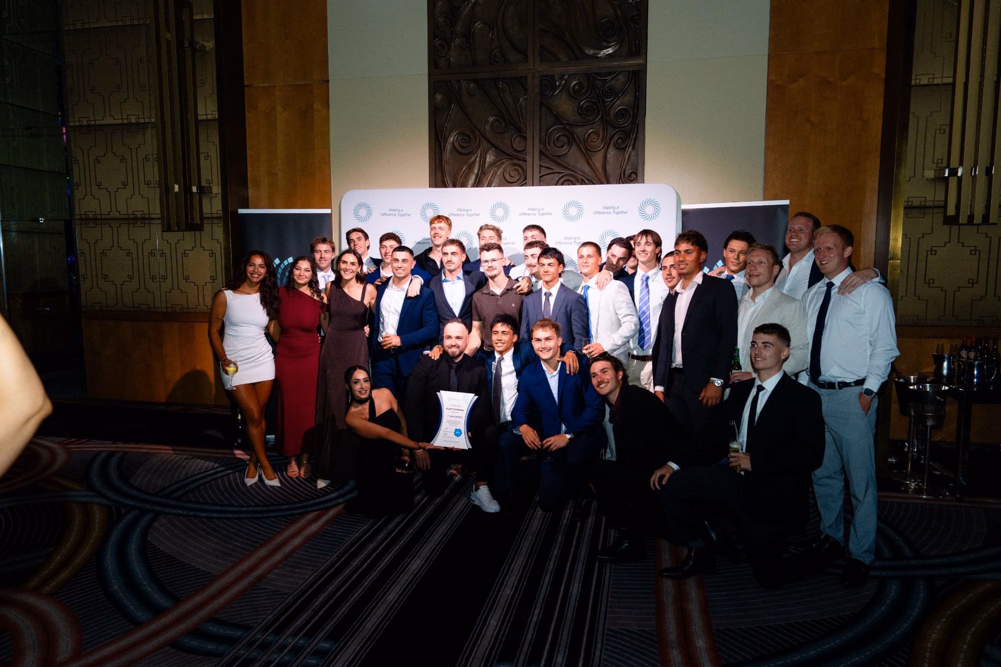 The Unlmted team together at an awards night
